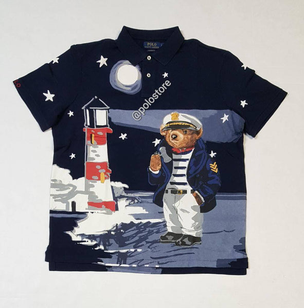 Navy sailor-themed Polo Ralph Lauren teddy bear polo shirt with classic fit, featuring nautical design and Polo Ralph Lauren branding.