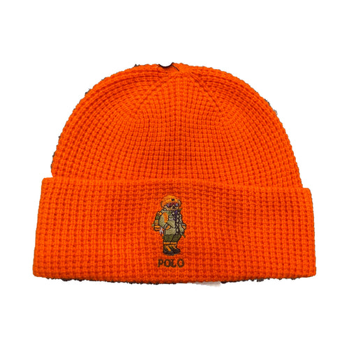 Polo Ralph Lauren orange Hiker Polo Bear Skully with embroidered bear logo on white fabric, casual and stylish accessory.